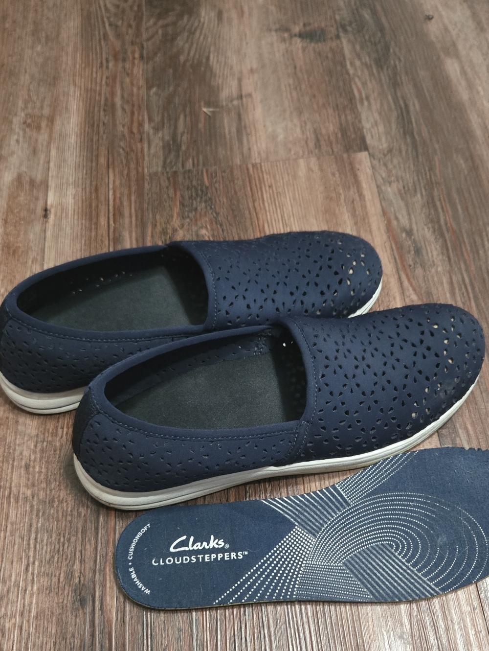 Clarks Navy Perforated Slip-On Flats - Cloudsteppers